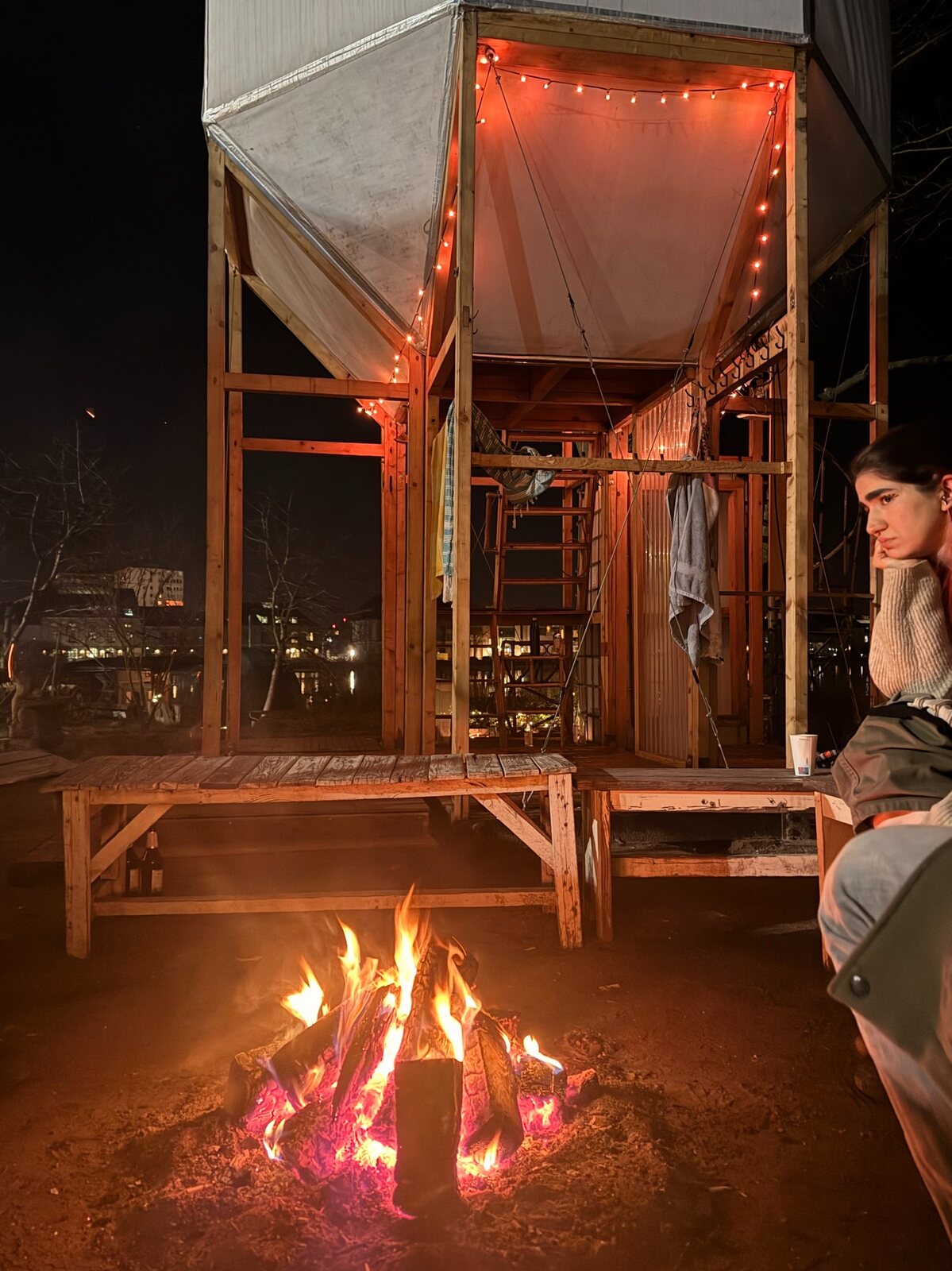 Bonfire and gathering space at night