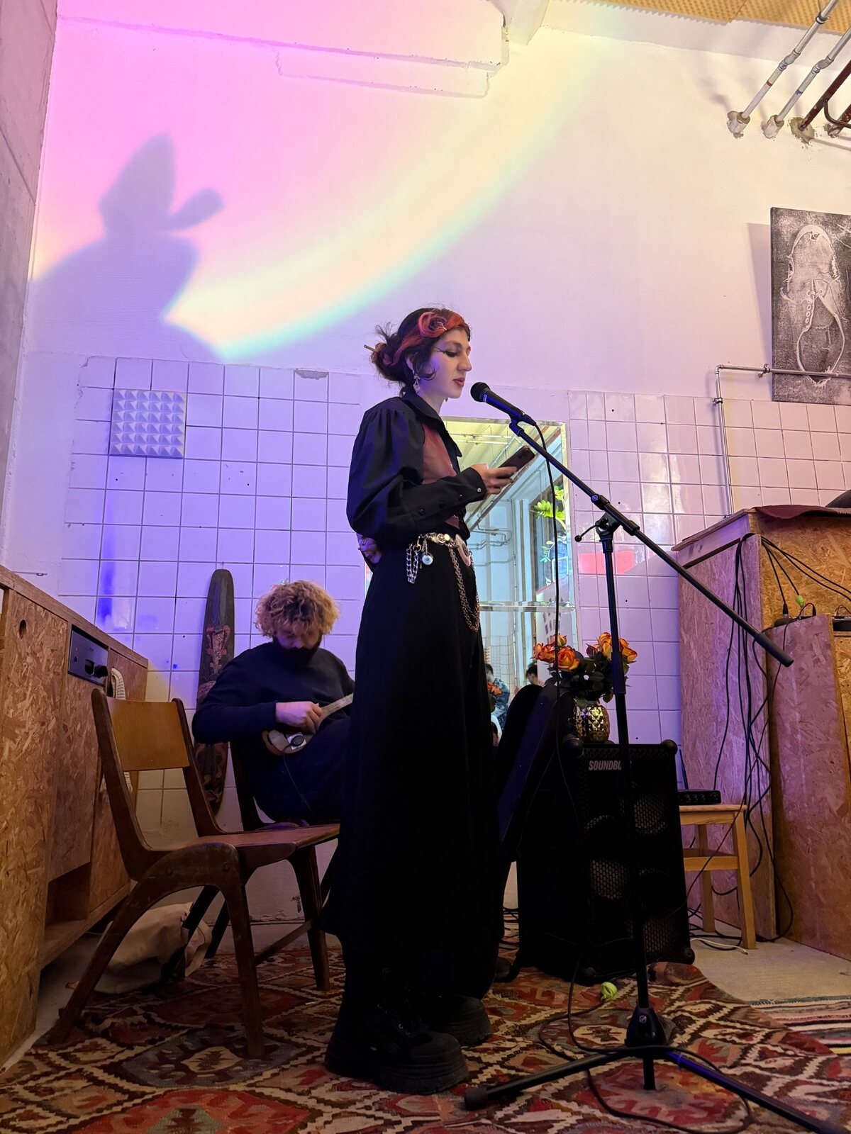 Spoken-word performance at a Hamm Collective event