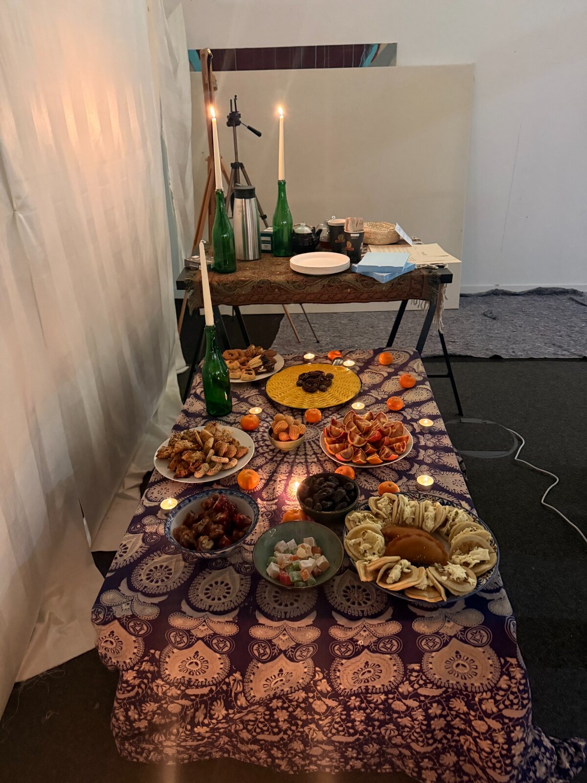 Shared food table with candles