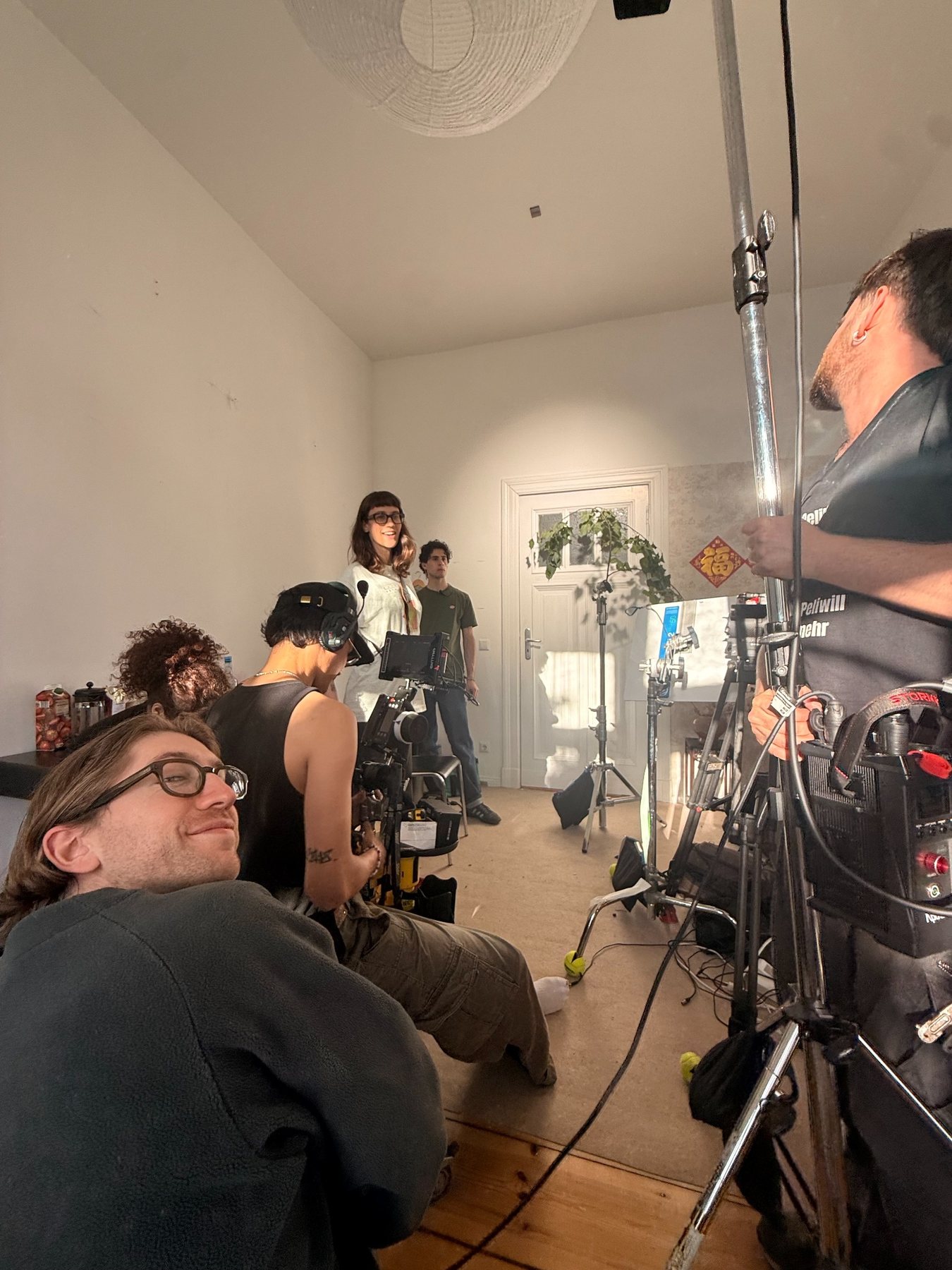Film crew working in an interior location