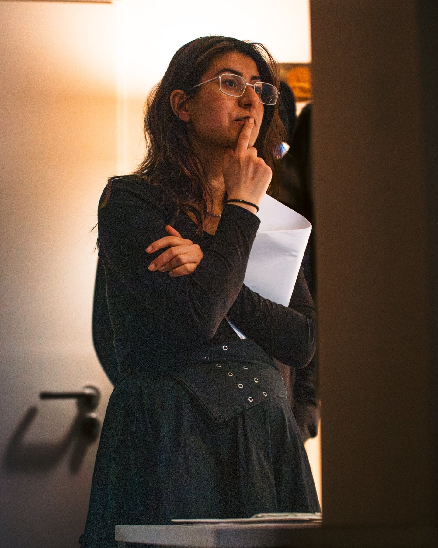 Yasaman reviewing work on set